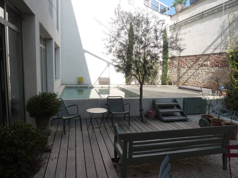 Aménagement d'une terrasse avec piscine  pour un confort de vie optimum à Lyon